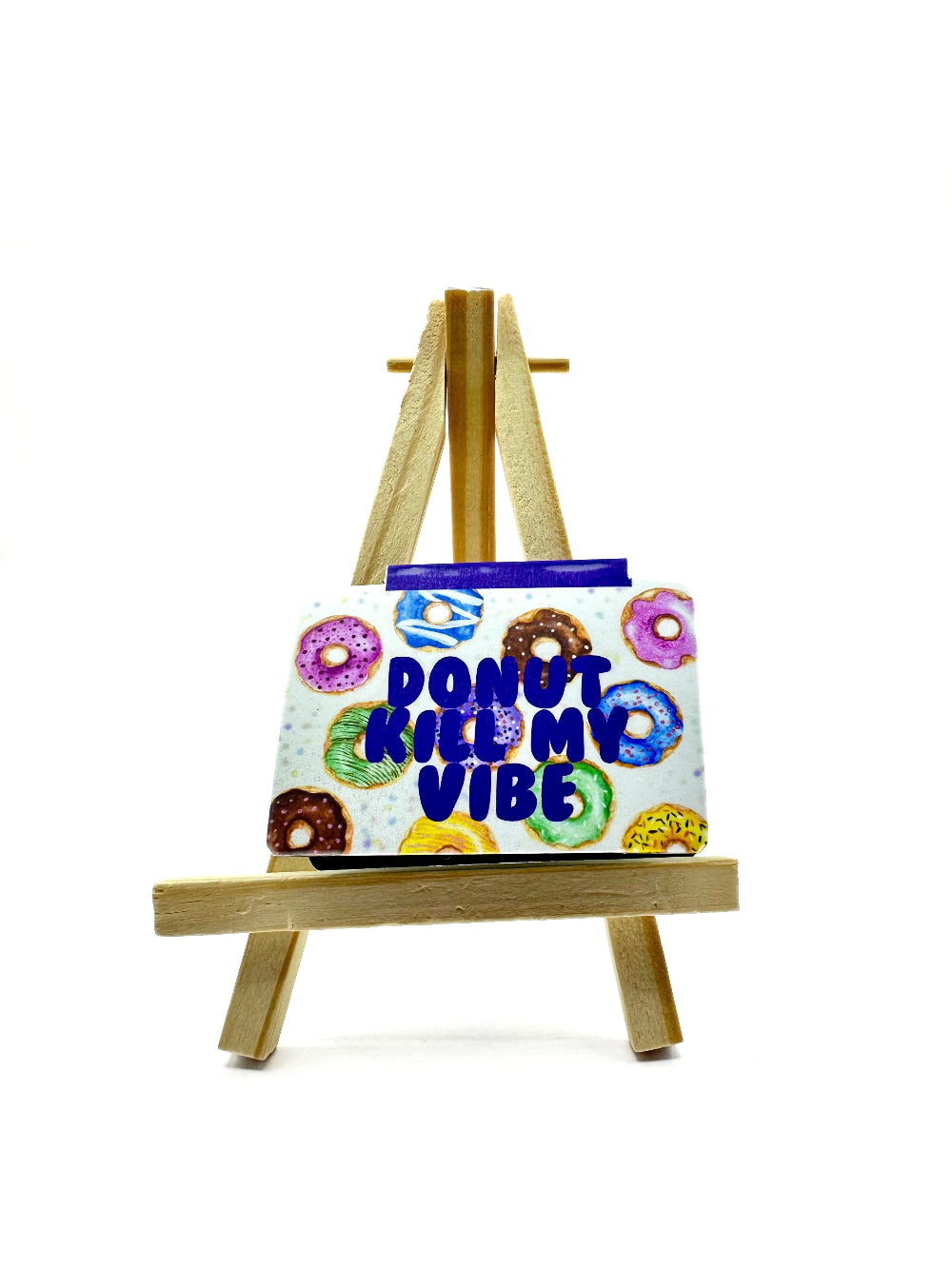 Magnetic bookmark with 'Donut Kill My Vibe' text on an easel against a white background