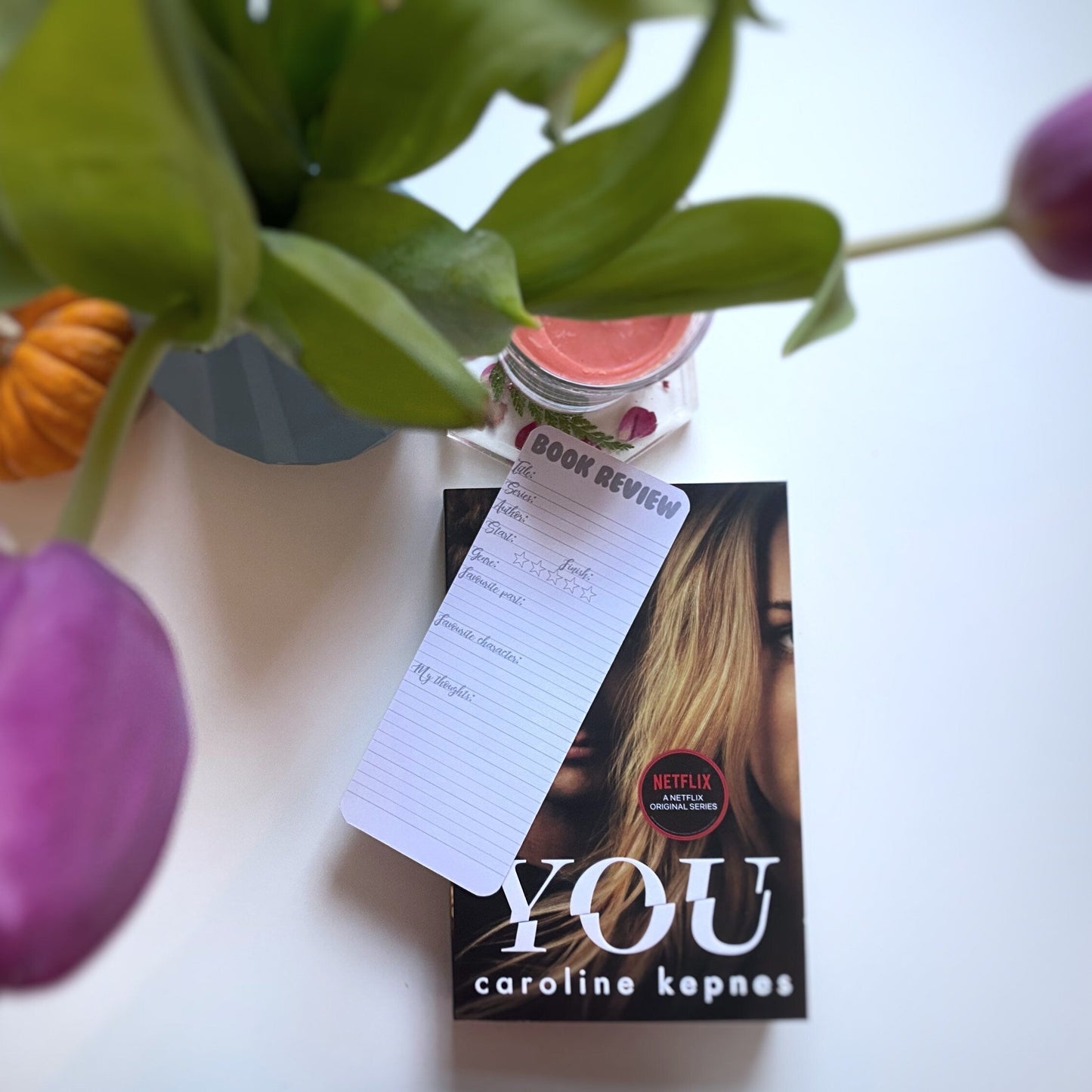 Functional book review bookmark with sticker stars setting on a book