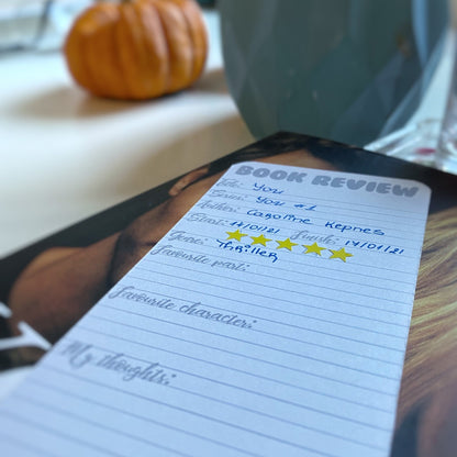 Functional book review bookmark with sticker stars setting in use