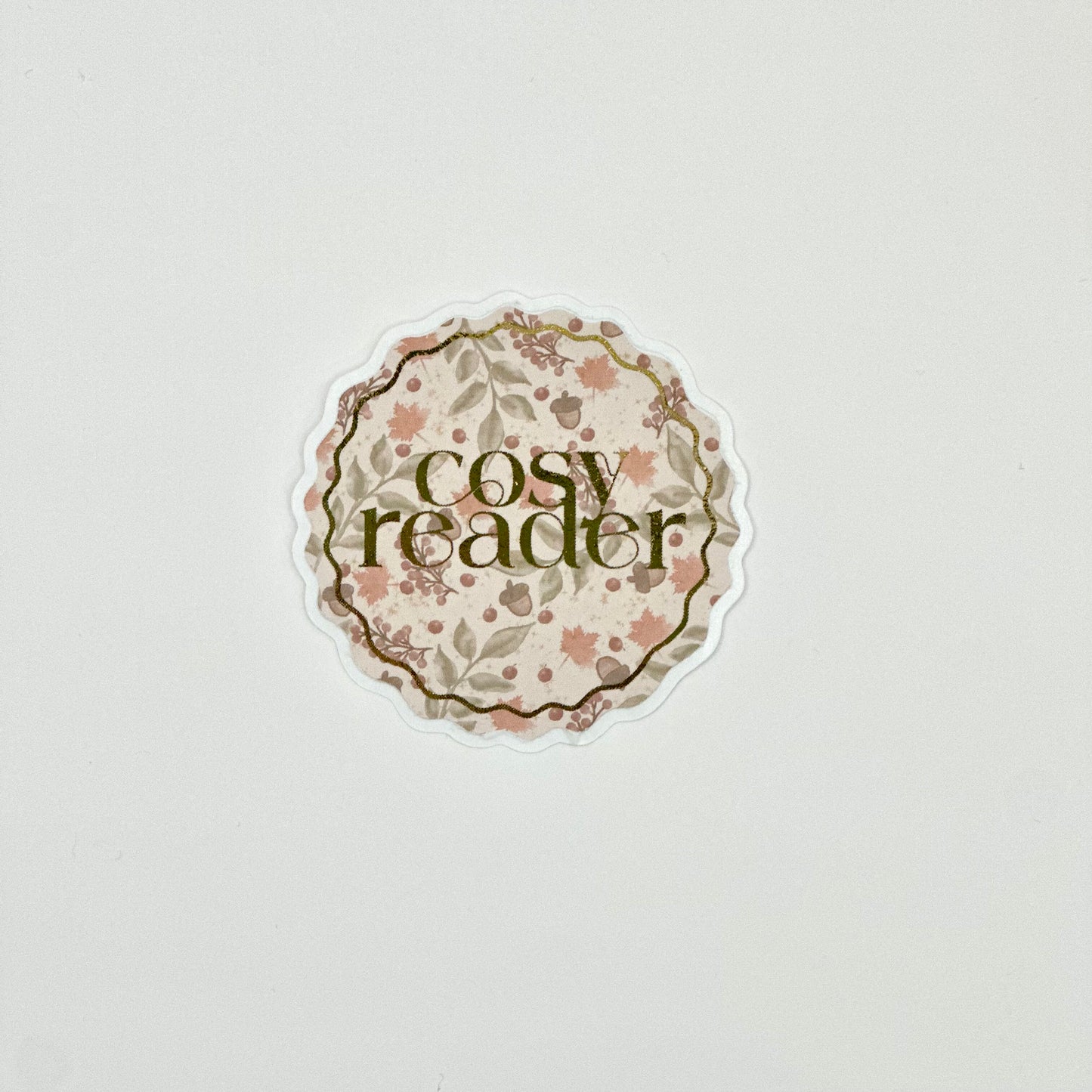 Aestetic autumn sticker with floral design and gold detail text 'cosy reader'. Side view
UK Small shop