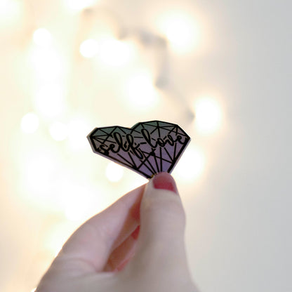 Holographic aesthetic self love heart sticker. Angle view