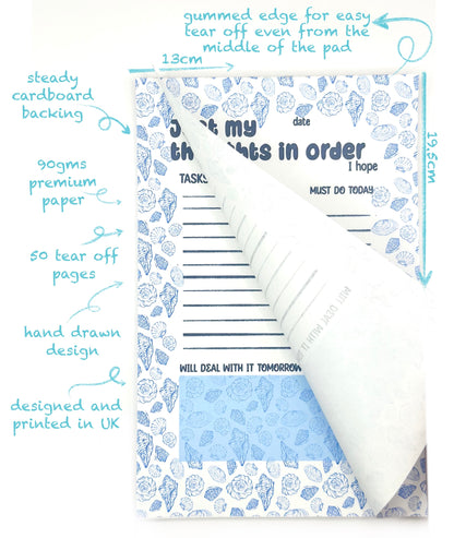 Notebook with coastal design and tear-off pages, featuring 'Just my thought in order' text and measurements.