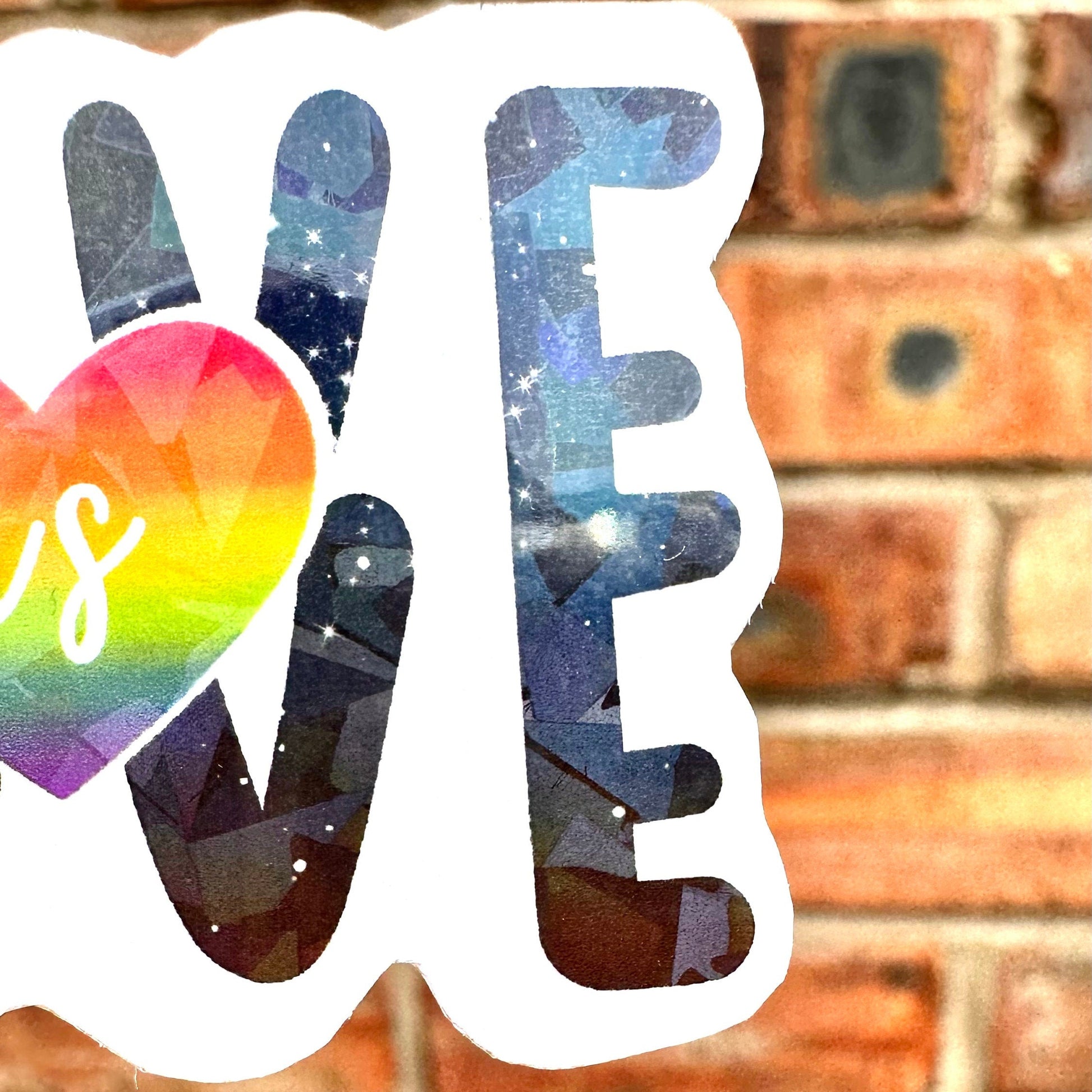 lgbtq love is love colorful heart sticker with holographic finish. Frontal