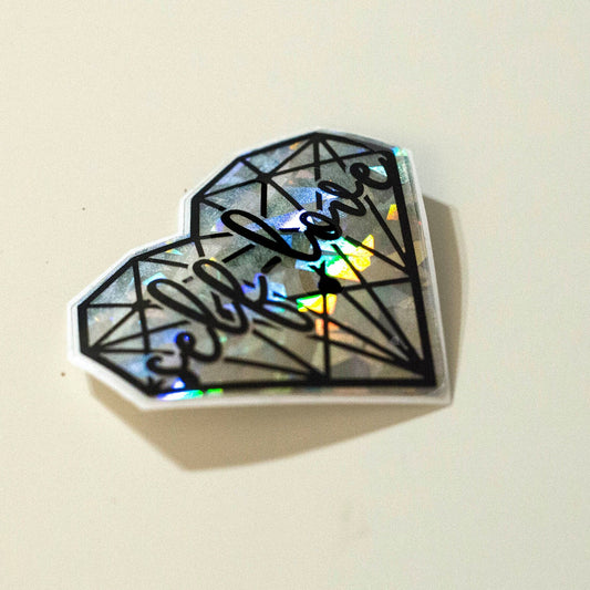 Silver broken glass Holographic aesthetic self love heart sticker. side view