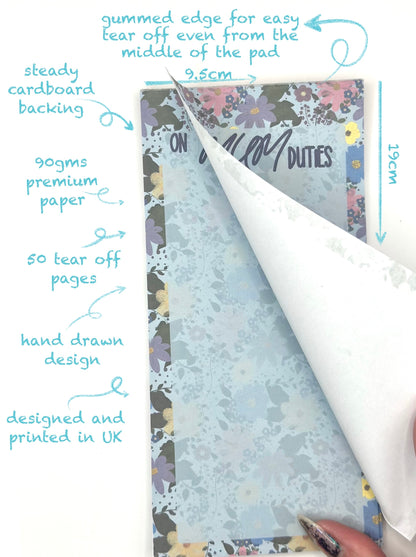 notepad with floral design and text on mum duties on white background