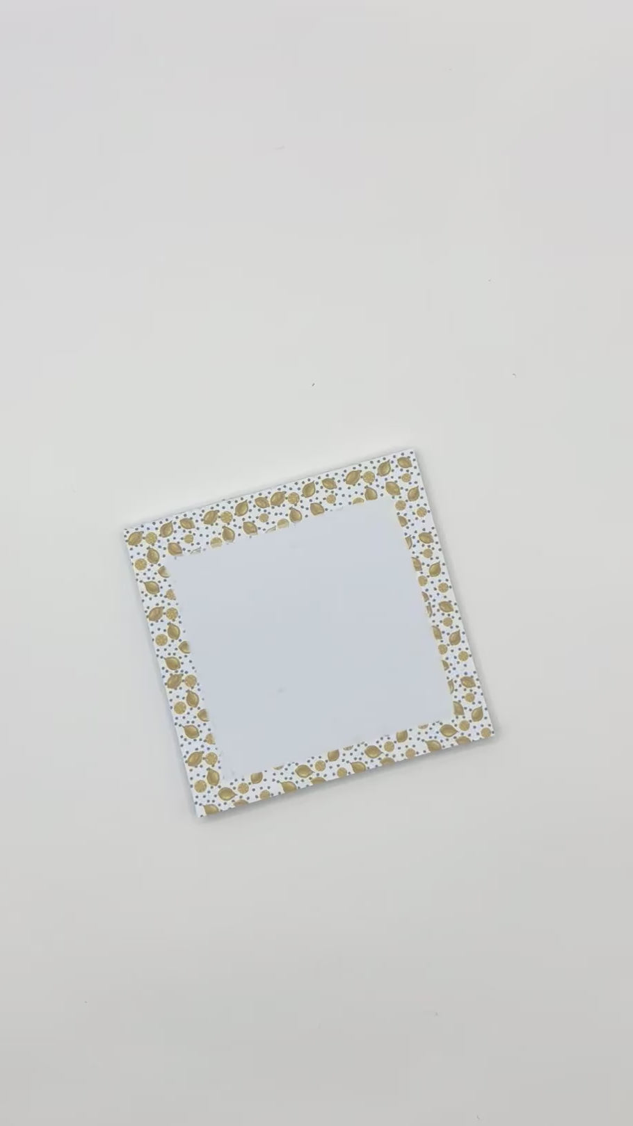 Showcasing square memo pad with lemon design