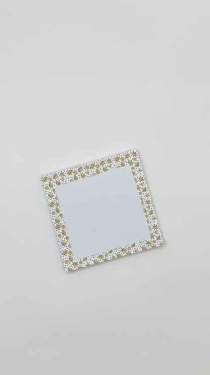 Showcasing square memo pad with lemon design