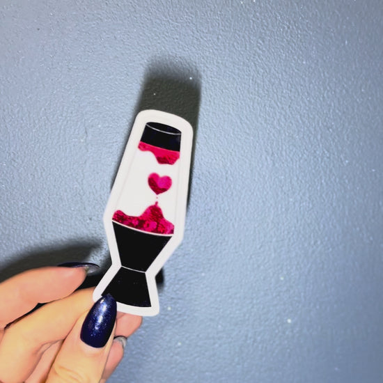 lava lamp sticker against blue wall