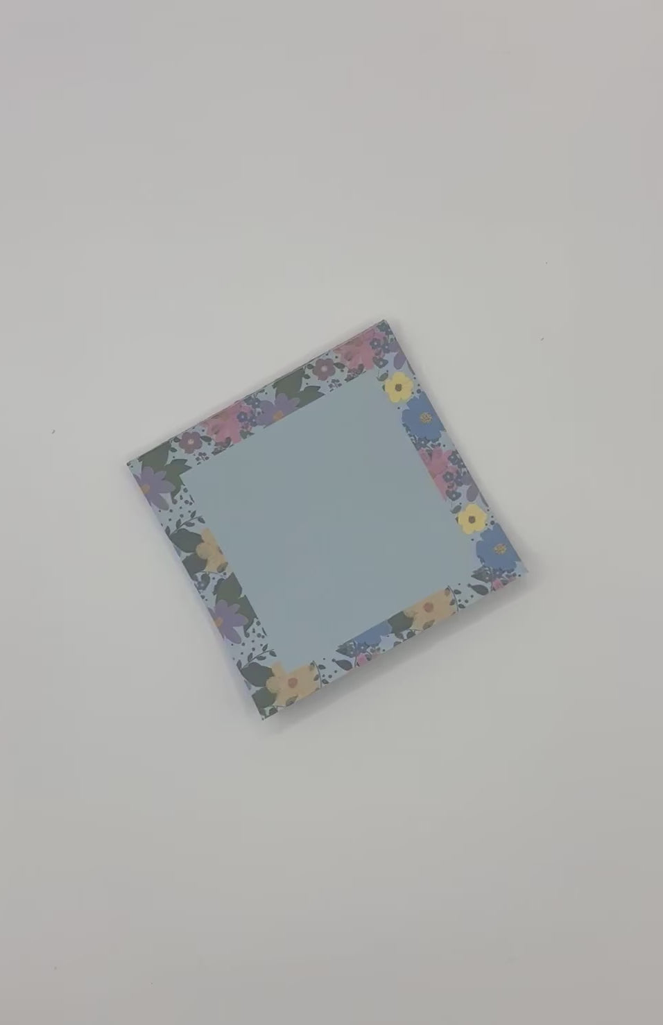 showcasing floral memo pad