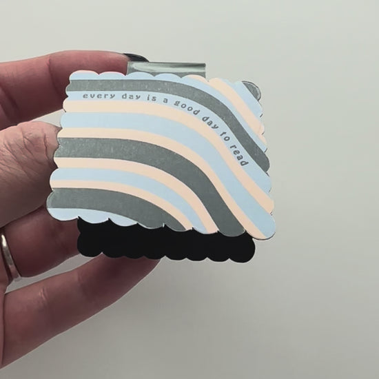 Video of colorful magnetic bookmark with text 'every day is a good day to read'