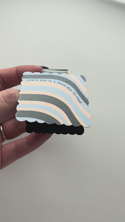Video of colorful magnetic bookmark with text 'every day is a good day to read'