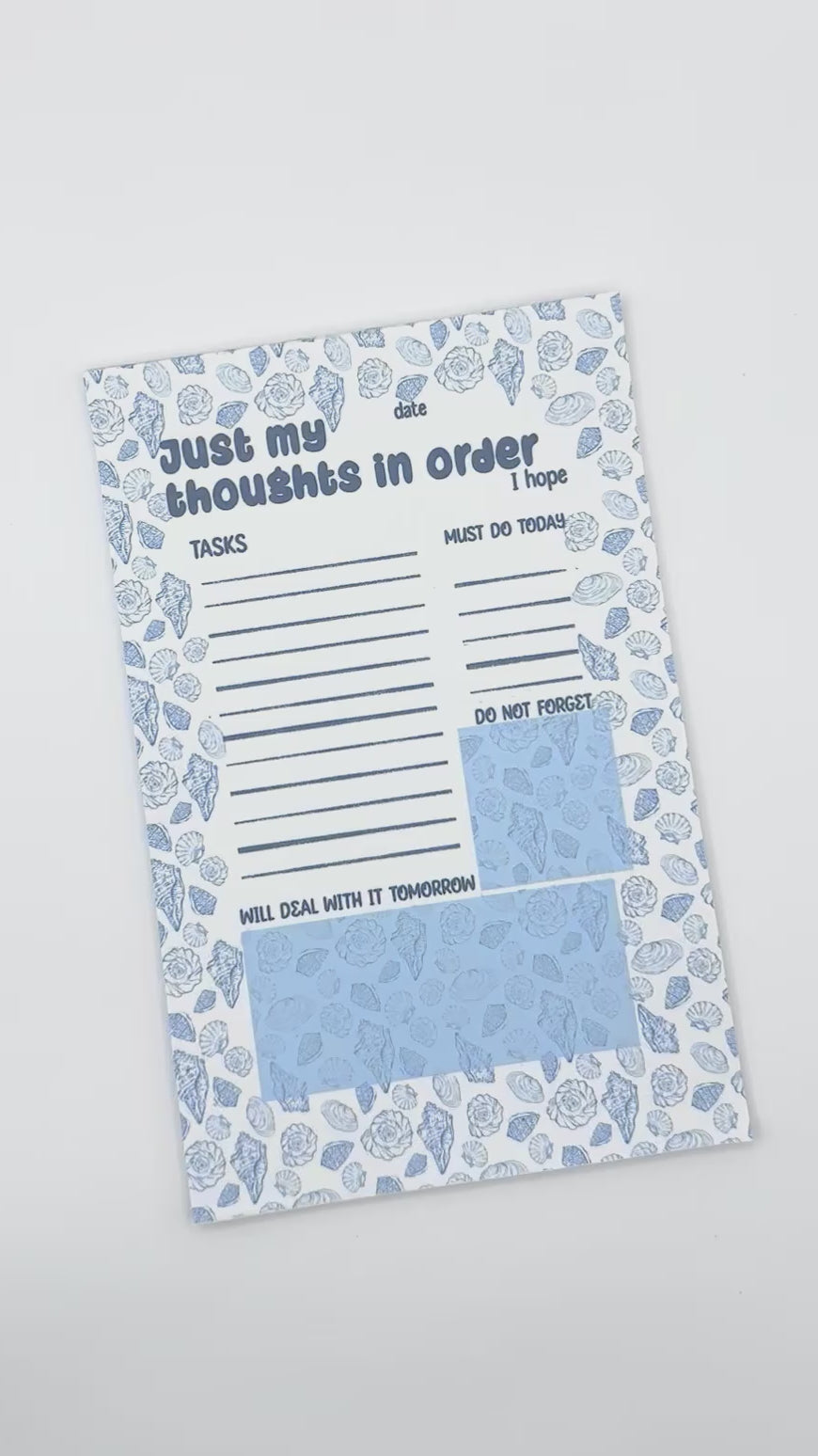 showcasing a notepad with text 'Just my thoughts'