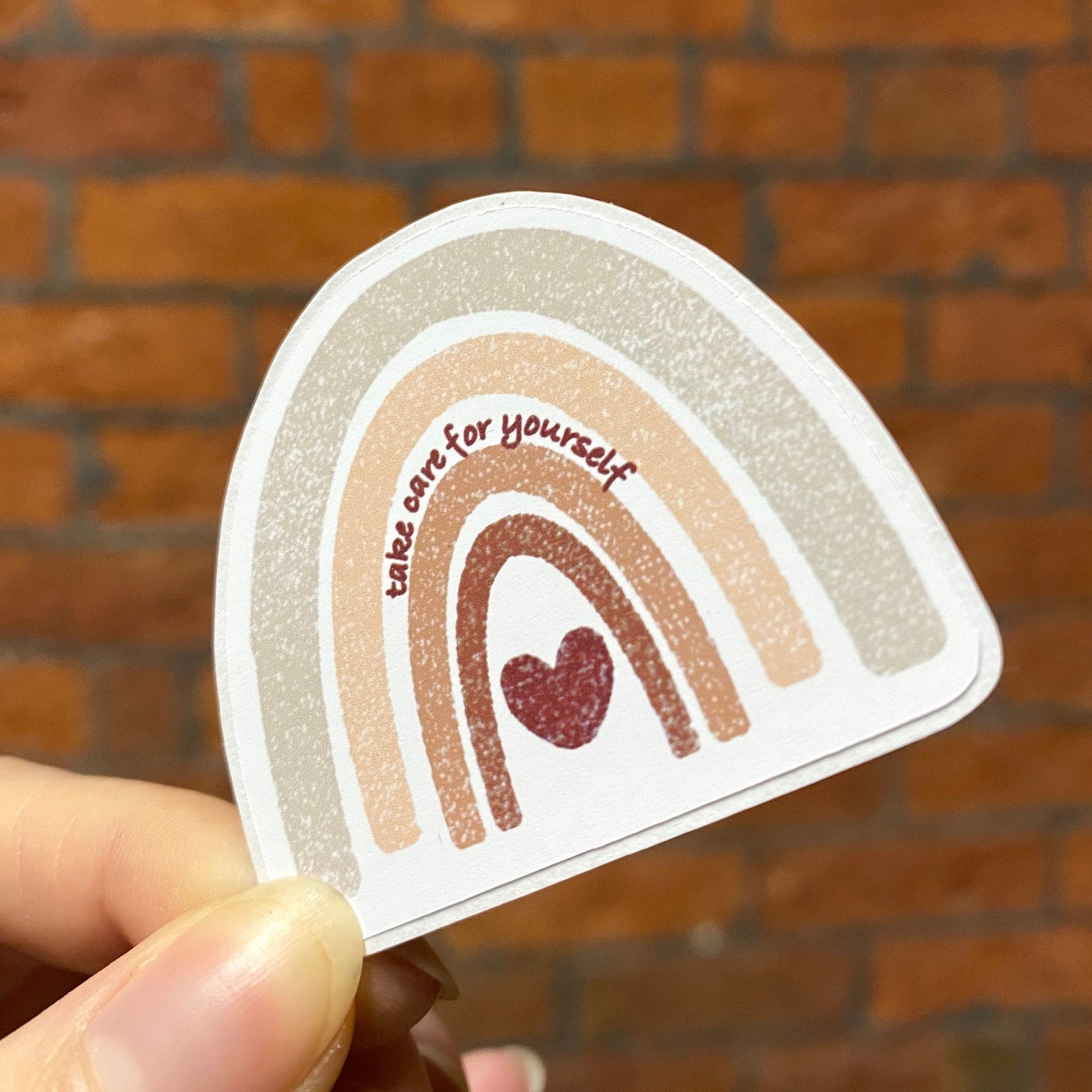 Aesthetic color rainbow sticker with 'take care for yourself' text. Frontal